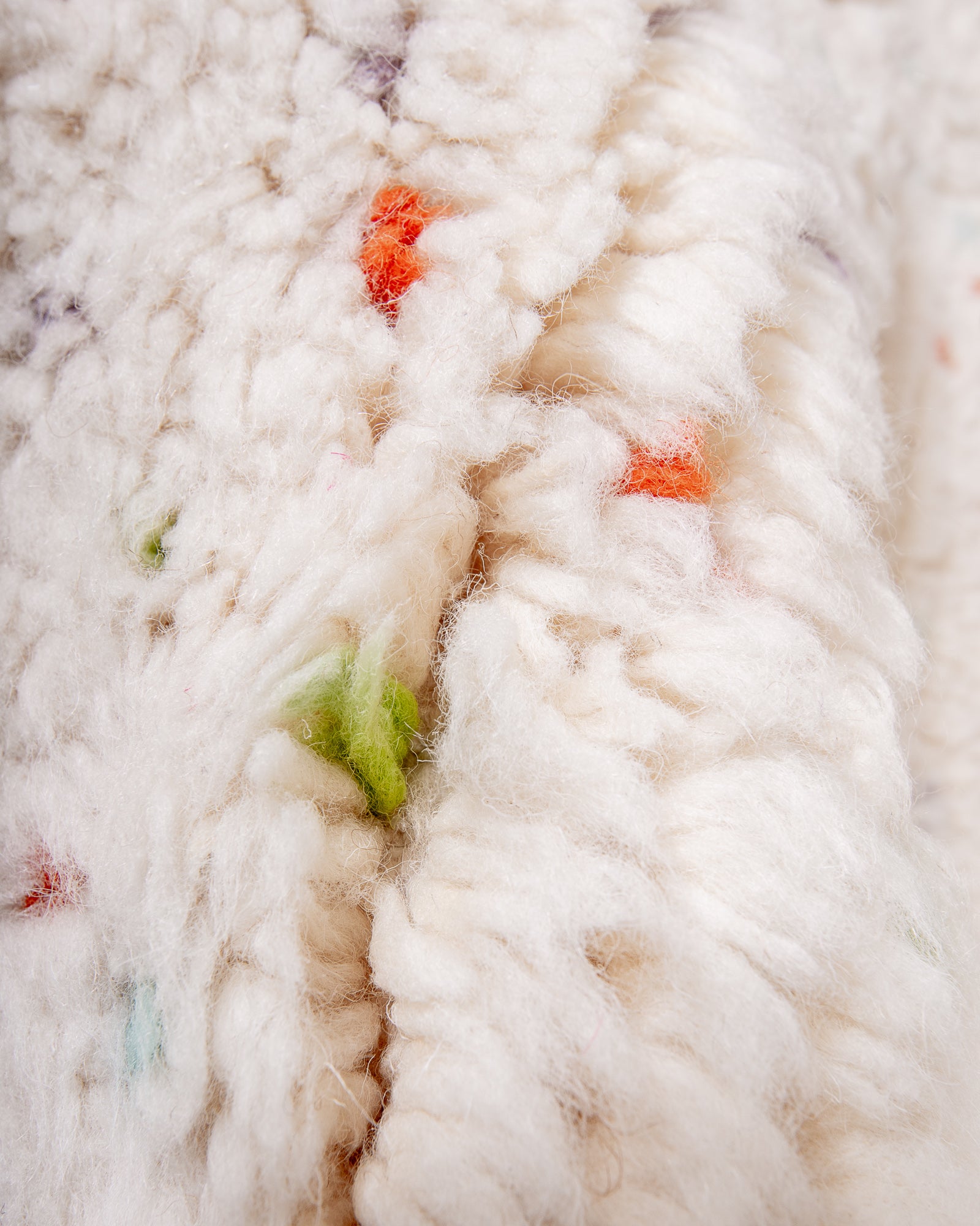 Modern, designer, handcrafted Berber rug from Morocco. Beniourain carpet with beautiful colours and patterns and fluffy wool texture.